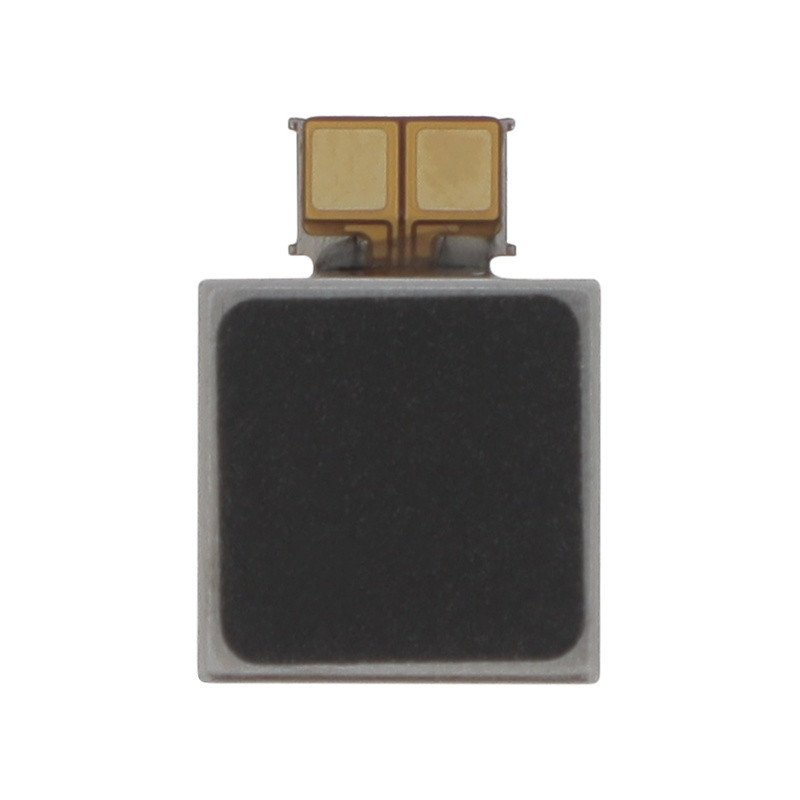 Module moteur de vibration linéaire posé sur fond blanc montrant le connecteur et la forme compacte